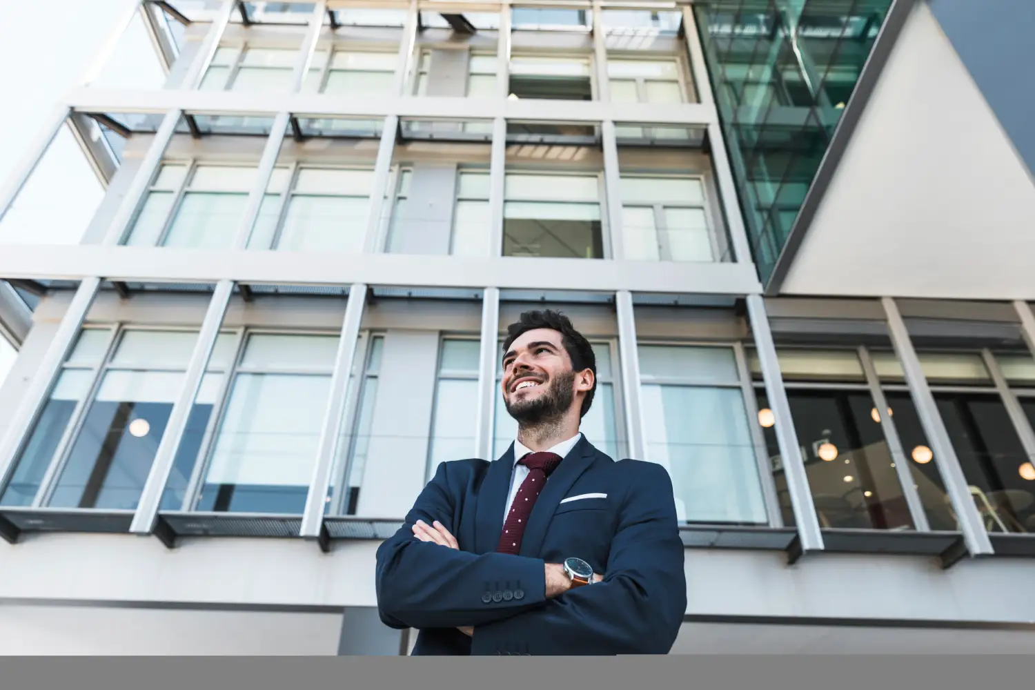 Persian real estate agent showing luxury home to diverse clients in modern living room