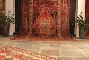 AZADI Fine Rugs logo