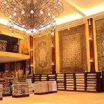 Tousi Rugs logo