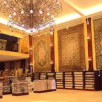 Tousi Rugs logo