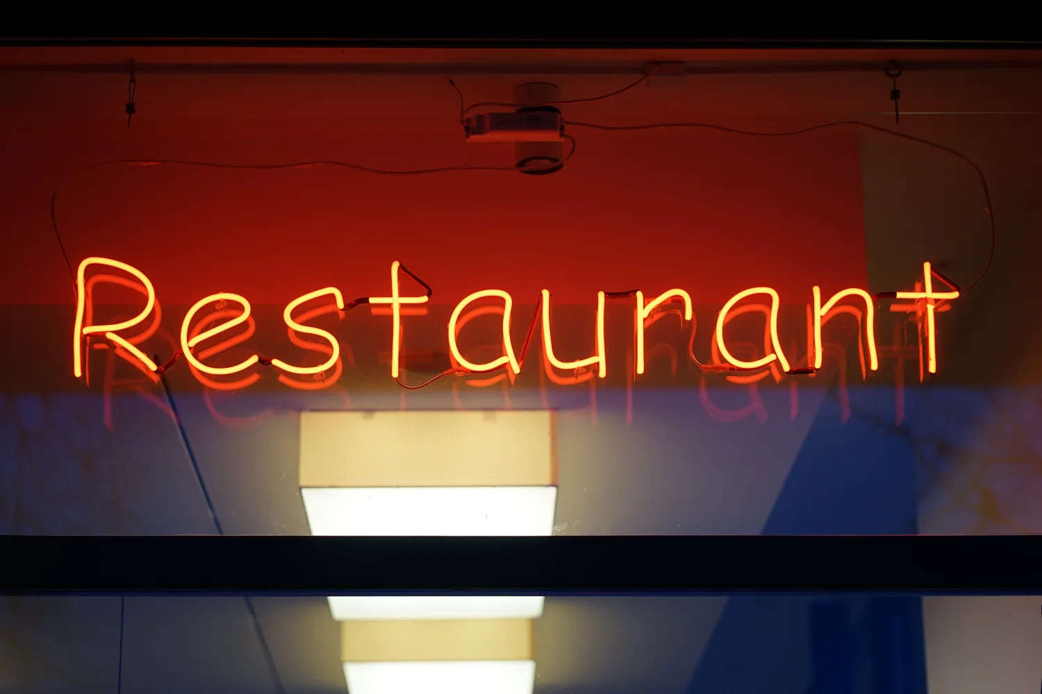 Neon restaurant sign representing Persian Restaurant Charlotte NC.