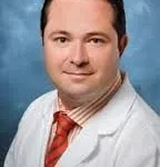 Dr. Reza Nazemi's logo