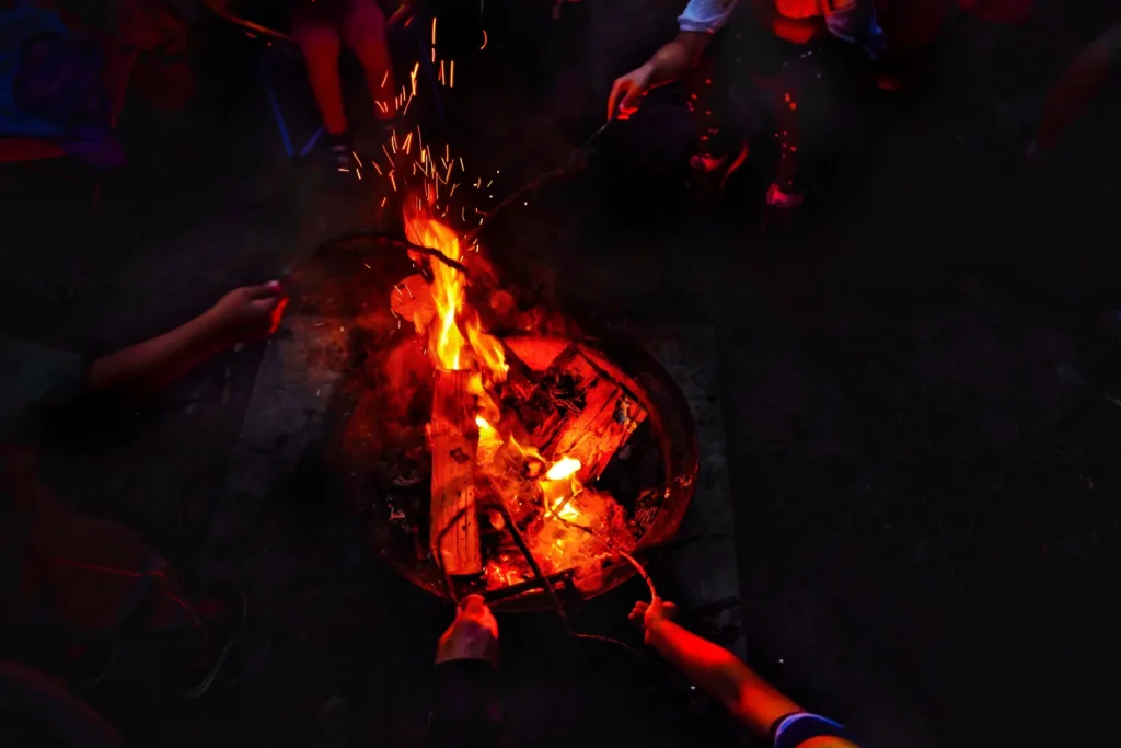 People jumping over a bonfire during Chaharshanbe Suri.