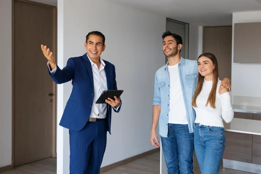 Persian real estate agent consulting with home buyers