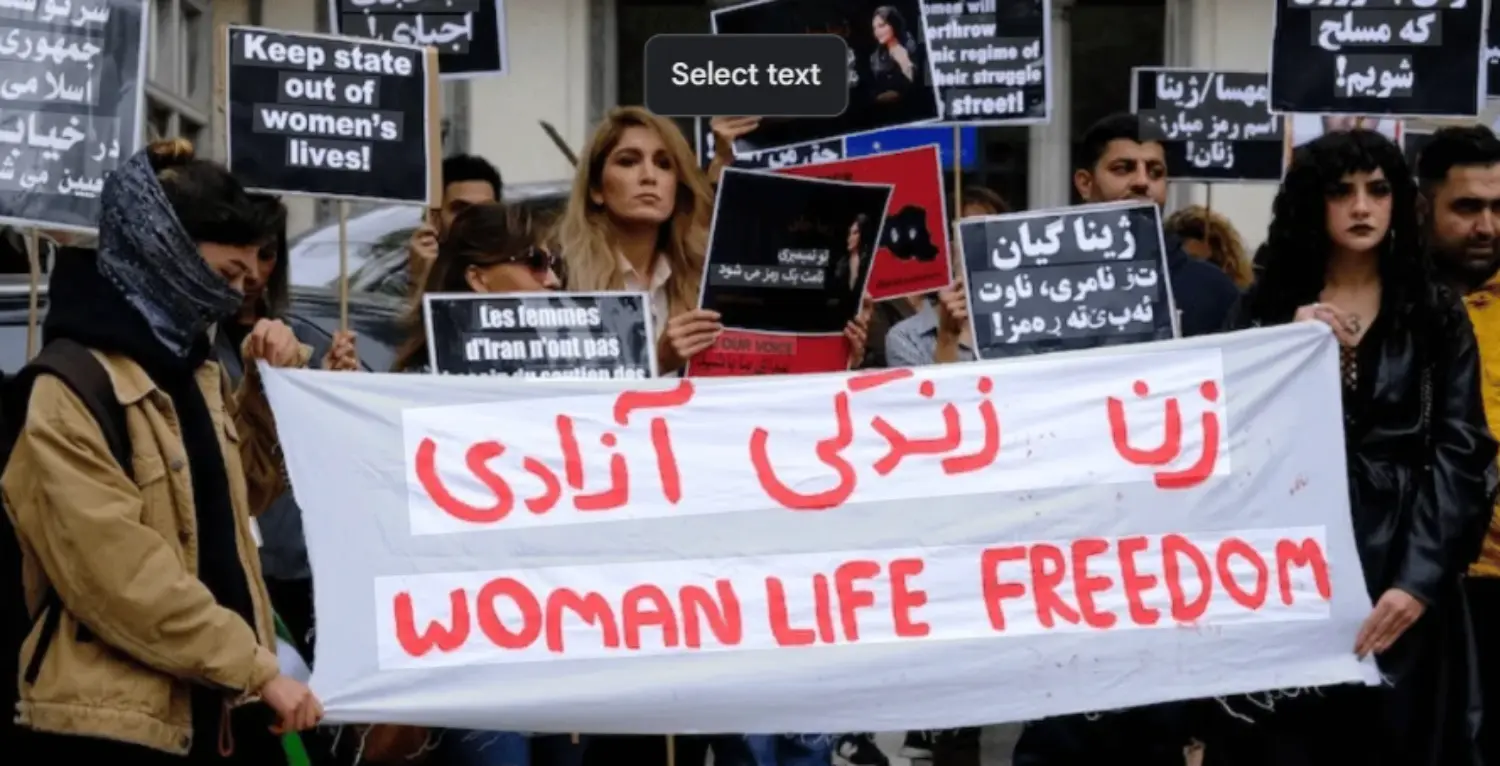 Protesters holding signs during the Woman, Life, Freedom Movement in Iran.