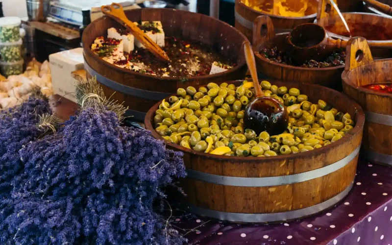 Inside Shiraz Mediterranean Foods in Charlotte with Persian herbs, spices, and prepared meals.