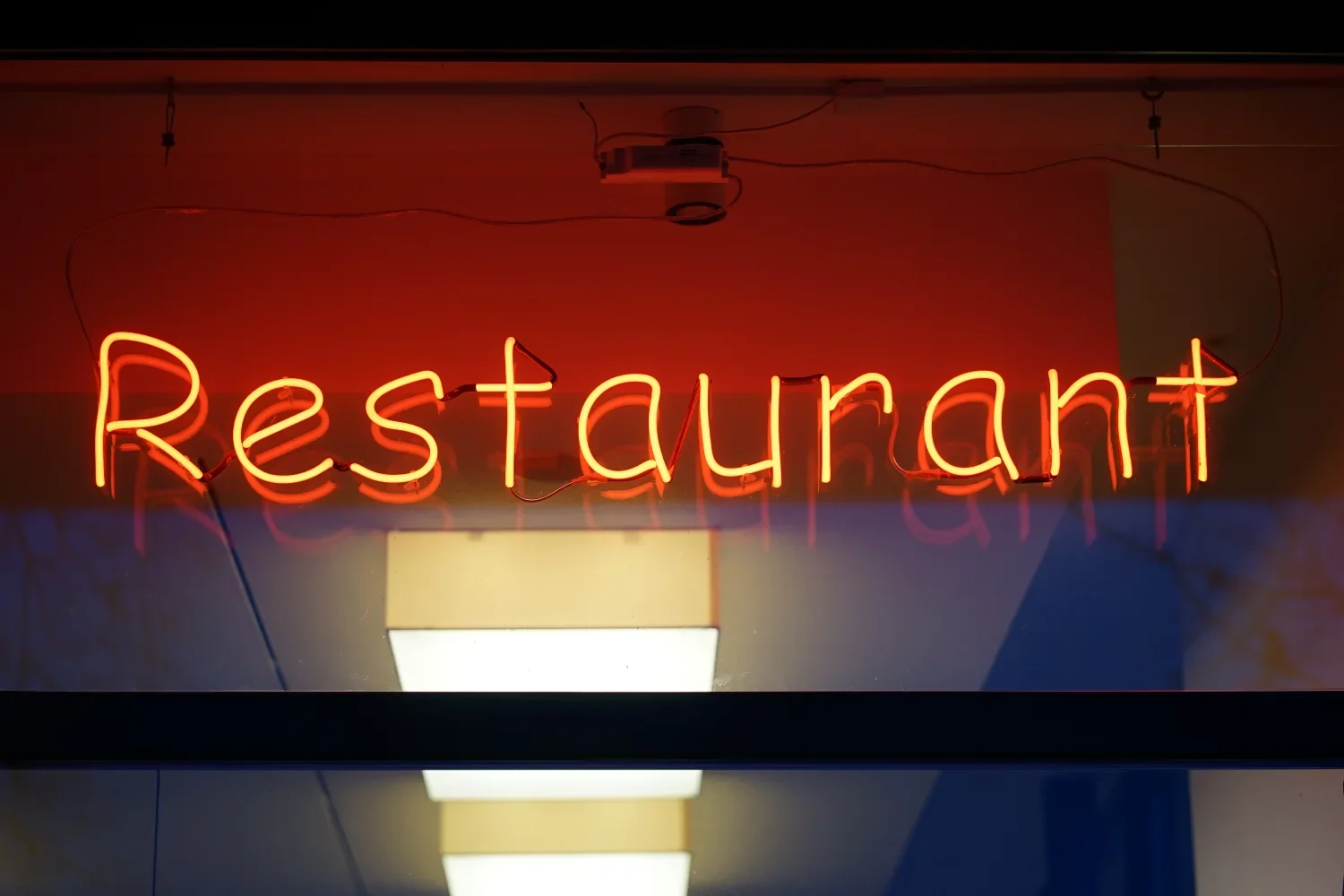 Neon restaurant sign representing Persian Restaurant Charlotte NC.